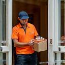 SwiftServe courier at doorstep